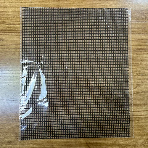 A PTFE mesh sheet presented flat within a transparent OPP packaging bag.