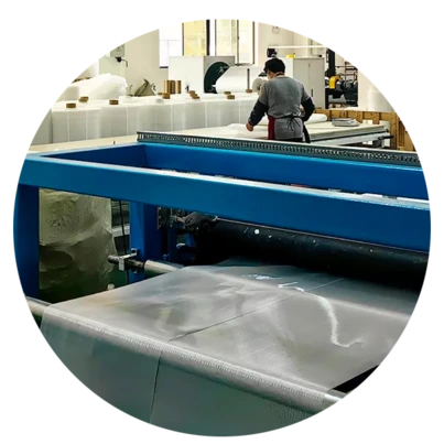 An automated extrusion production line manufacturing high-quality PEVA liners inside a manufacturing plant.