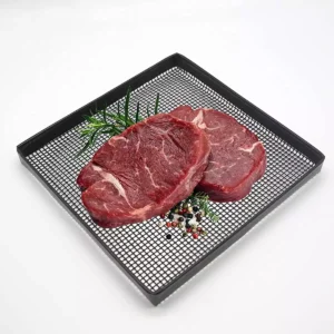 PTFE Bound Edge Grill Mesh Tray Wholesale main product showing a lightweight square shallow tray with fresh raw beef steaks