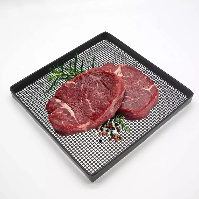 PTFE Bound Edge Grill Mesh Tray Wholesale main product showing a lightweight square shallow tray with fresh raw beef steaks