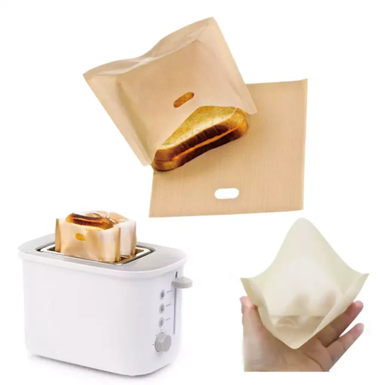 Premium non-stick ptfe toaster bag holding a sandwich inside a slice toaster to demonstrate cross-contamination prevention.