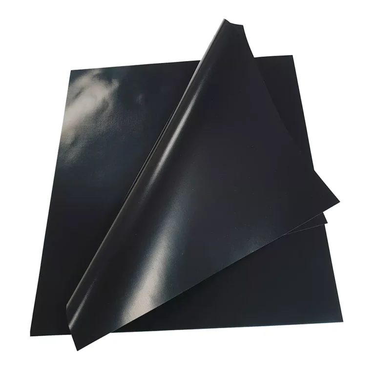A premium 0.14mm flexible premium PTFE bbq grill mat sheet with heavy liquid Teflon coating flat-stacked for bulk B2B wholesale.