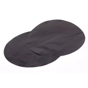 Multiple charcoal black round PTFE baking mat disks stacked together, highlighting smooth precision die-cut edge profiles for bulk wholesale.